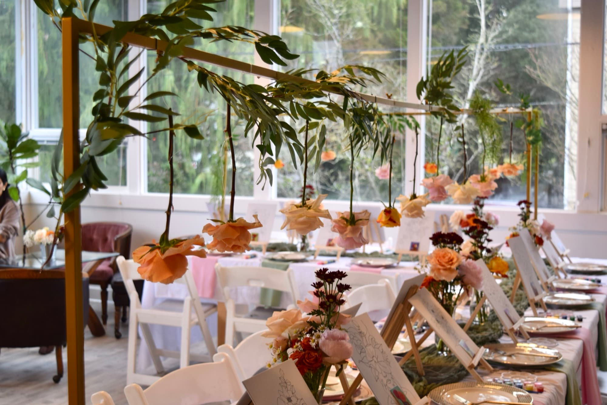 A wide view of a styled wedding reception.